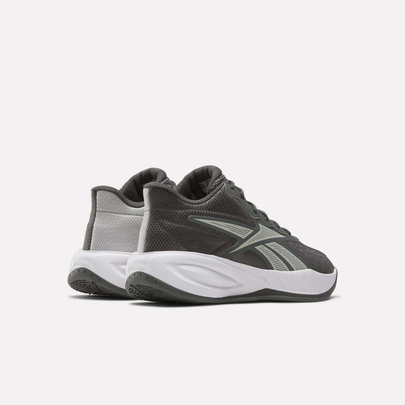 A pair of Reebok Press Basketball Shoes in dark gray with white soles, light gray accents, and EVA cushioning, displayed from back and side angles on a plain light background.
