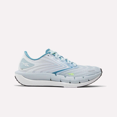 Light blue Reebok Women's FloatZig Tread Running Shoes with white and light blue accents, lace-up closure, breathable mesh upper, thick supportive white sole for grip, and classic logo—ideal for treadmill workouts.