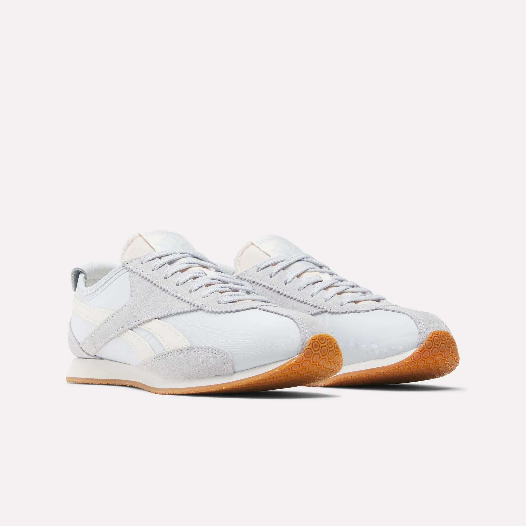 A front view of Reebok R400 Shoes in white and light gray with gum soles, displayed on a plain white background.