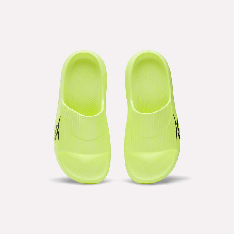 A pair of neon yellow Reebok DMX Recovery Walking Slides with textured footbeds, moving air cushioning, and a black logo on the side, shown from above on a white background.