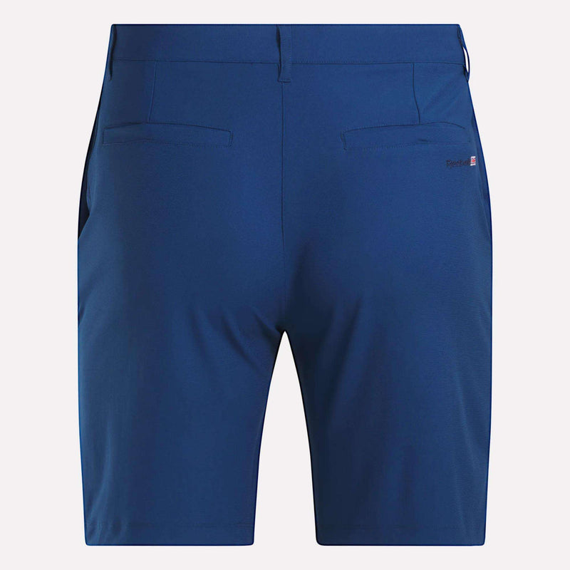Back view of Reebok Men's The Favorite Golf Shorts - 9" Inseam in blue, featuring two welt pockets, a small right-side logo, and sweat-wicking four-way stretch fabric for lasting comfort.