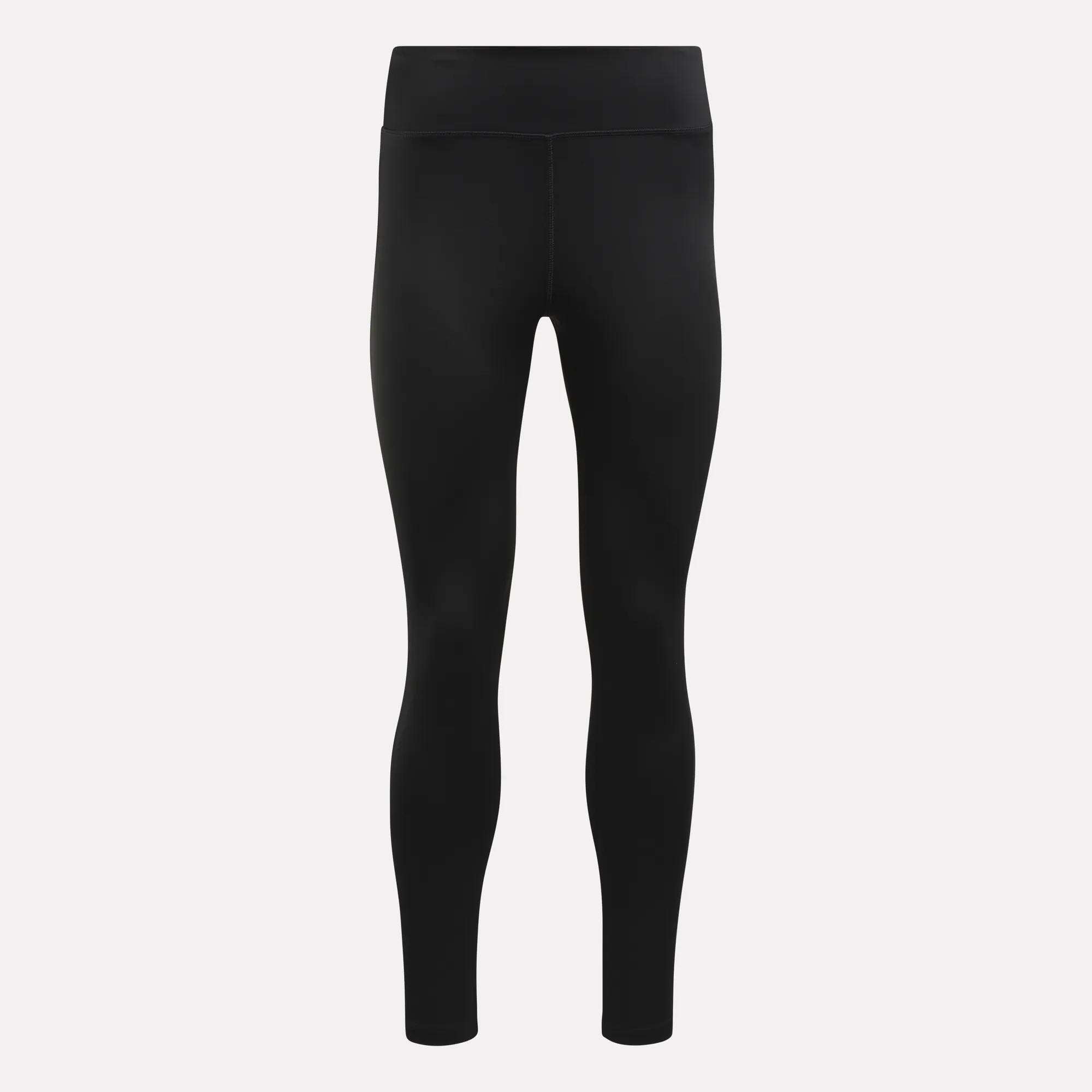 Black, full-length Women's Lux High-Rise Tights from Reebok, featuring RBK-DRY performance fabric and a seamless, smooth texture. These high-waisted training leggings are shown on a plain white background with no visible logos or patterns.