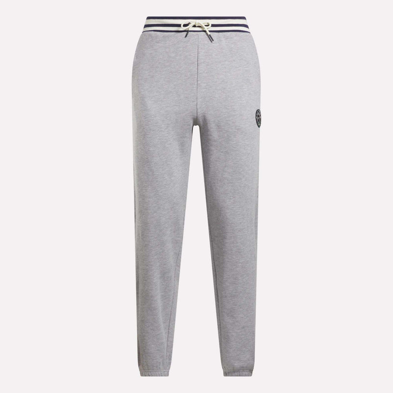 Reebok Men's Lawn Club French Terry Jogger Pants in light gray feature a cotton-blend fabric, navy striped drawstring waistband, straight legs, and a small circular logo on the left thigh. Stylish everyday sporty comfort. Shown on a white background.