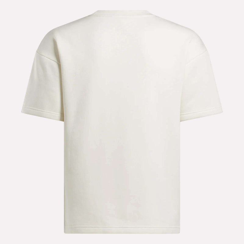 The Reebok Men's Wardrobe Essentials T-Shirt is a relaxed fit white crewneck tee, shown from the back against a light background.