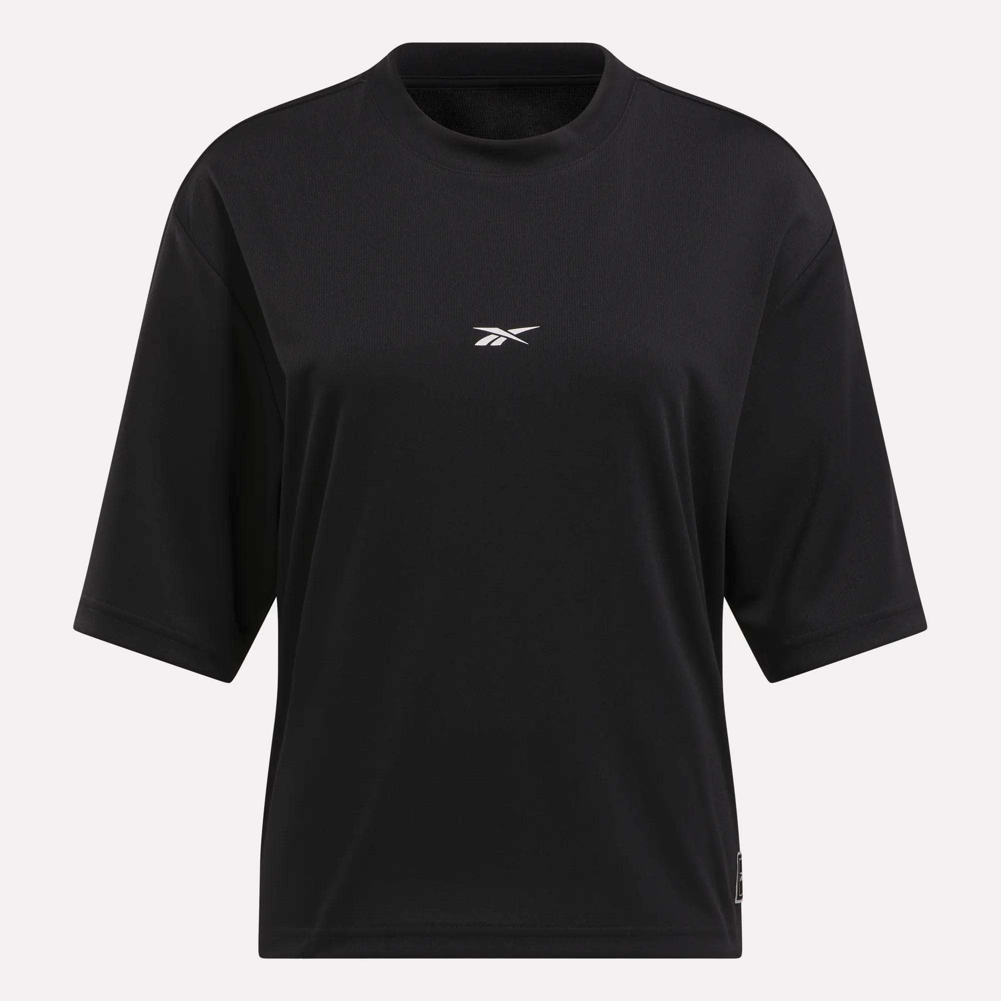 A plain black Reebok Women's Basketball Mesh T-Shirt with short sleeves and a small white logo on the chest, displayed on a light background.
