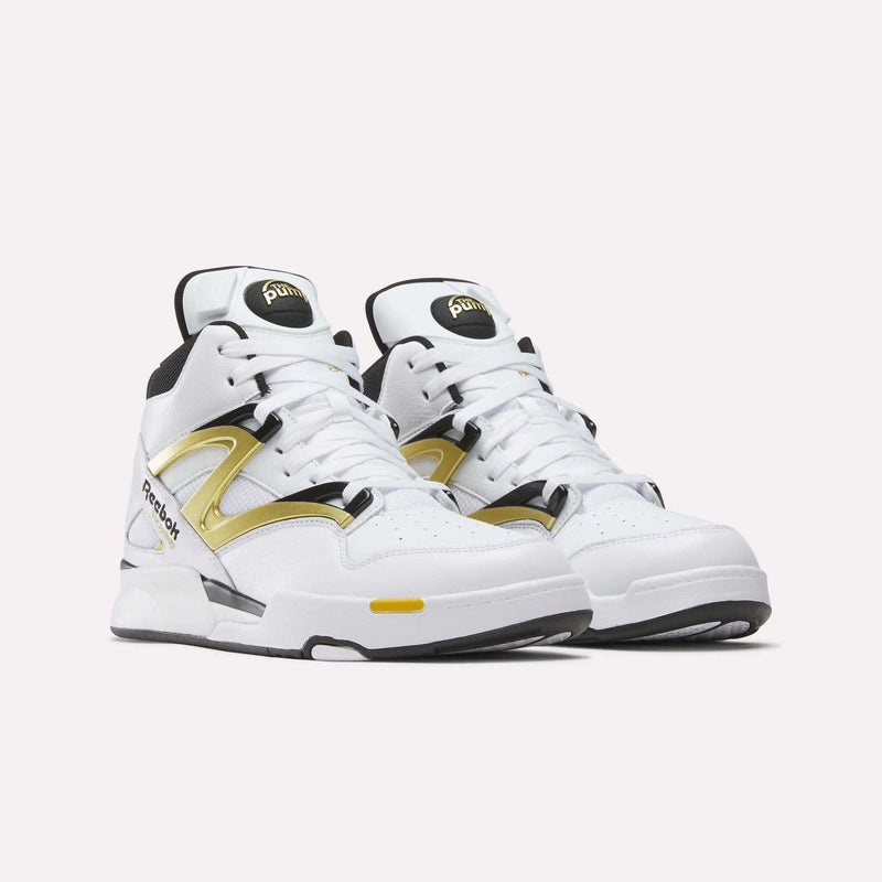 The Reebok Pump Omni Zone II Shoes are white high-top basketball sneakers with black, gold, and yellow accents, iconic Pump button and logo, shown on a plain white background for a classic retro vibe.