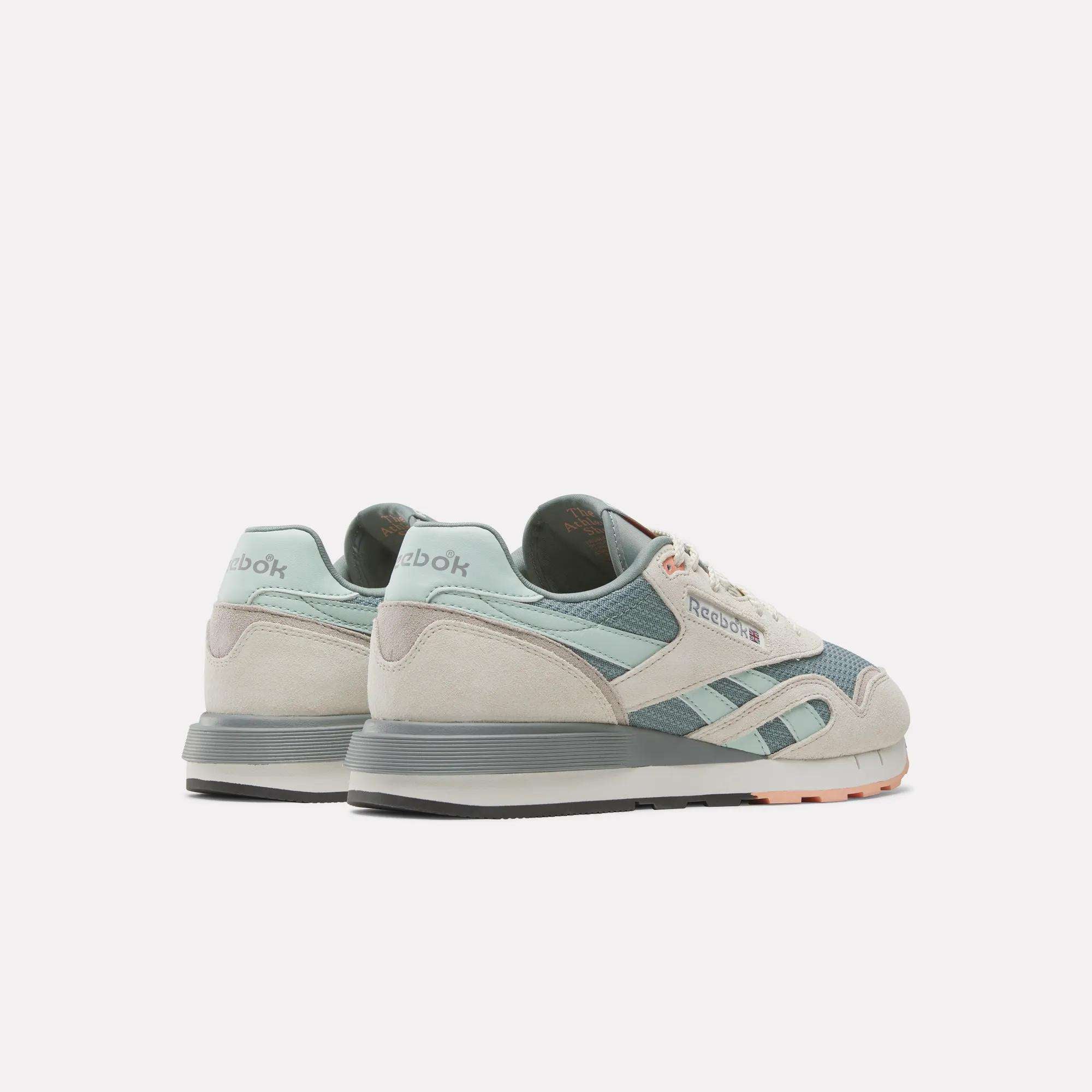 A pair of Reebok Classic Nylon 89 Shoes in light blue, gray, and white with a cushioned midsole, displayed from the back and side on a plain white background.