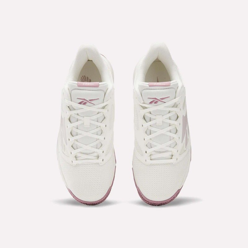 A pair of Reebok Engine LT Shoes in white with pink accents, seen from above, highlighting the tops and neatly tied laces. The lightweight upper offers comfort and breathability for daily wear.