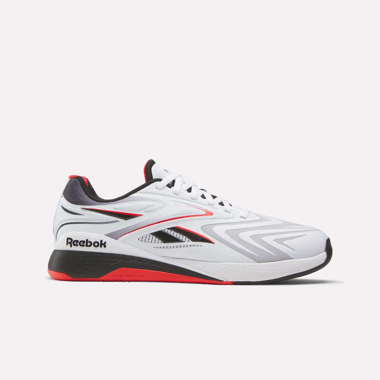 A white Reebok athletic shoe with red and black accents, featuring a low-cut design, mesh upper, and the Reebok logo on the heel and side.