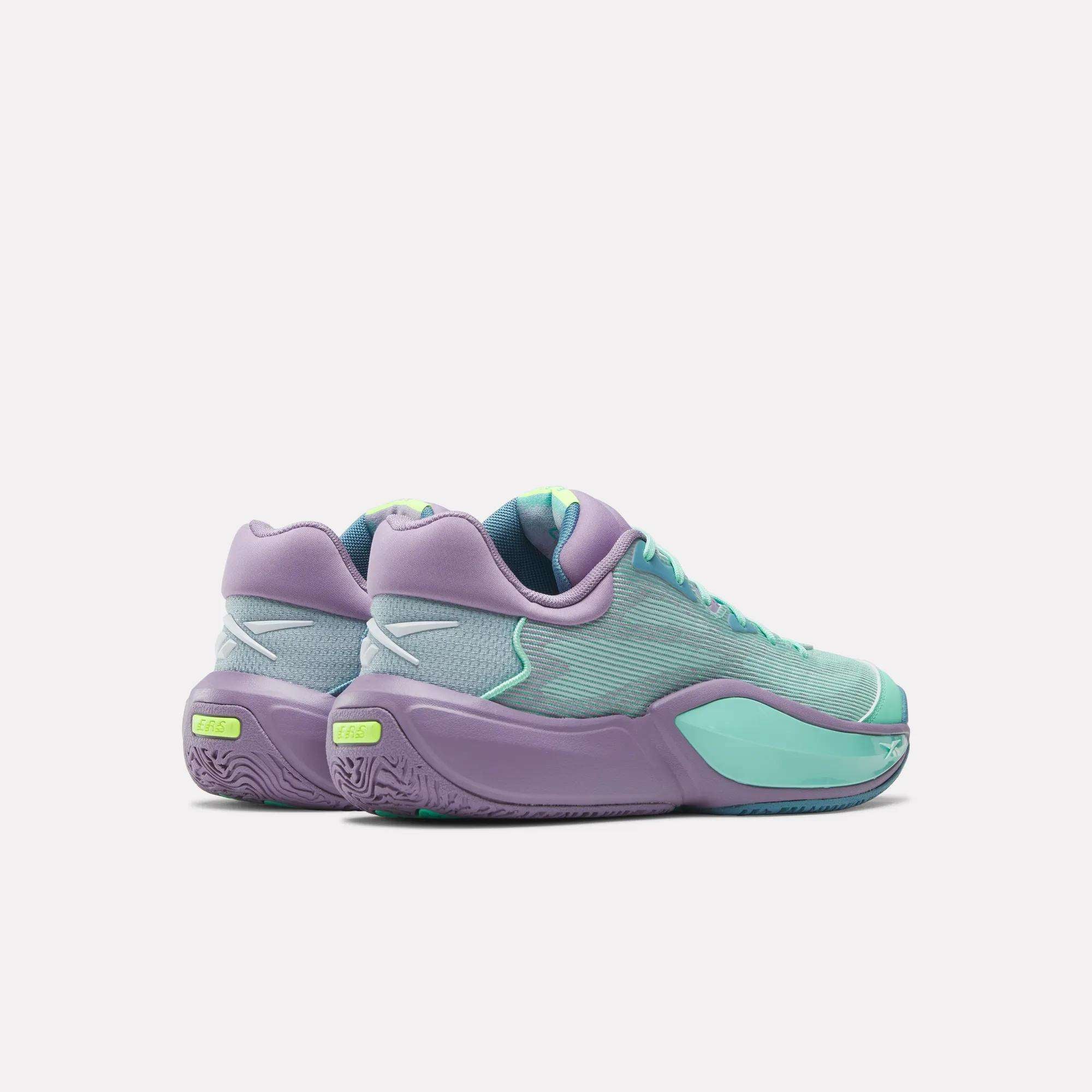 The Reebok Engine A 26 Basketball Shoes feature a pastel design with mint green uppers, lavender midsoles, and turquoise accents for stability, shown at an angle to highlight the back and sides against a white background.