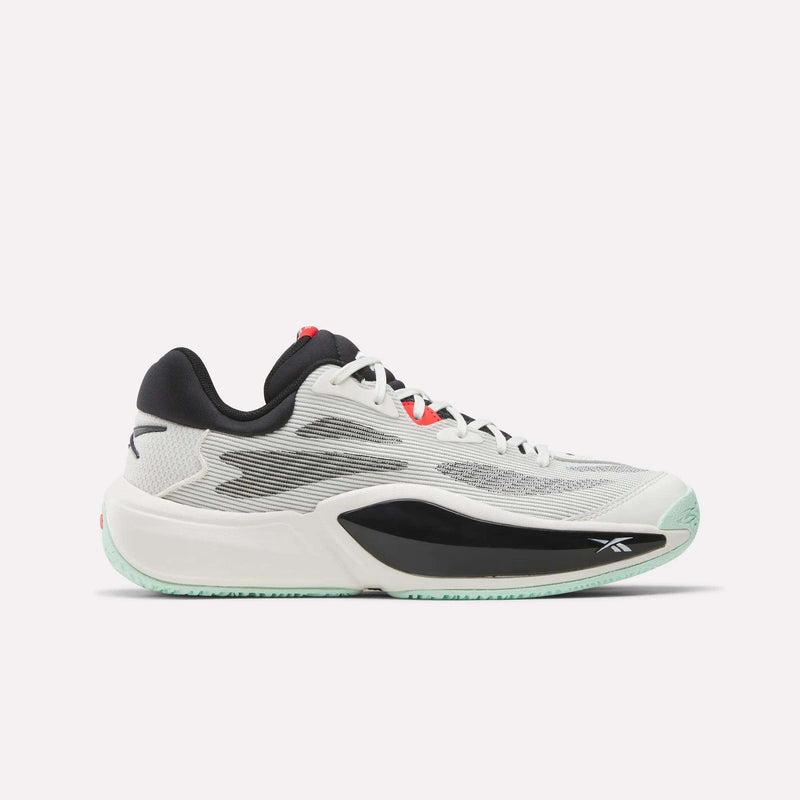 The Reebok Engine A 26 Basketball Shoes feature a white and light gray design with black and mint green accents, black heel and tongue, red lace eyelets, and side Reebok logo, delivering basketball-inspired stability. Displayed on a plain white background.