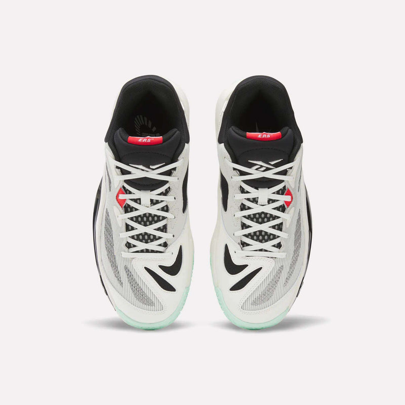 A top-down view of Reebok Engine A 26 Basketball Shoes in white with black, gray, and red accents, black interiors, and light teal soles—engineered for energy return and stability—displayed side by side on a white background.