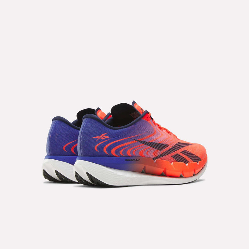 Reebok SpeedShifter running shoes featuring a blue-to-orange gradient, thick white midsoles, and black outsoles.