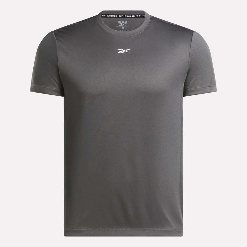 The Reebok Men's Short Sleeve Tech Training T-Shirt is a dark gray, sweat-wicking gym shirt with a crew neck, short sleeves, and a small white logo on the chest. It features a plain design ideal for athletic training.