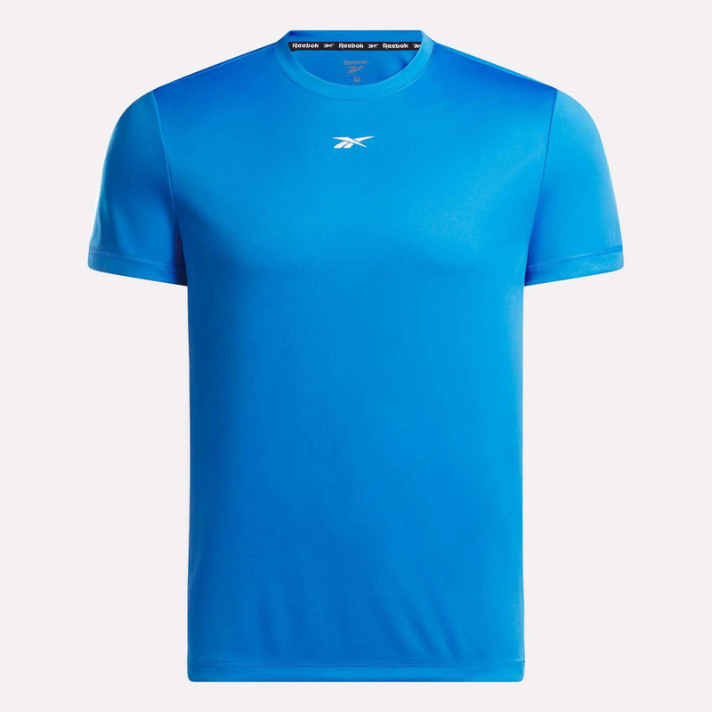 The Men's Short Sleeve Tech Training T-Shirt by Reebok features a bright blue color, small white chest logo, short sleeves, and RBK-DRY fabric for superior comfort, shown on a white background.