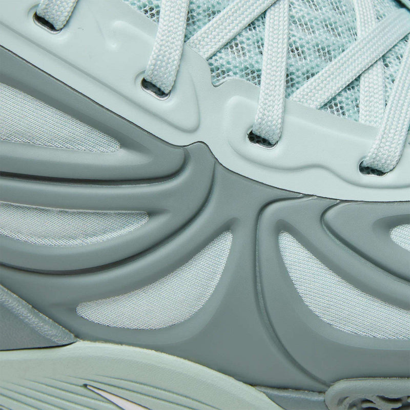 Close-up of a light blue and gray Reebok Angel Reese 1 Basketball Shoe, featuring mesh fabric, textured rubber overlays, layered patterns with detailed stitching, laces, and the Reebok Energy Return System for performance.