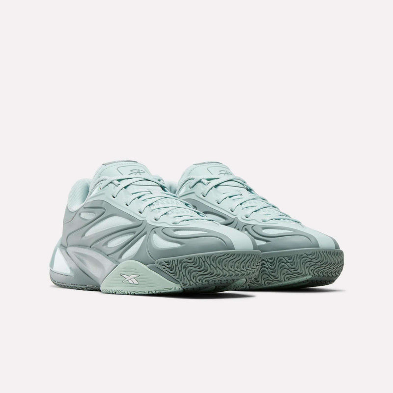 The Reebok Angel Reese 1 Basketball Shoes feature light blue color, a sculpted futuristic design with chunky soles, wavy side textures, and the advanced Reebok Energy Return System, inspired by Angel Reese.