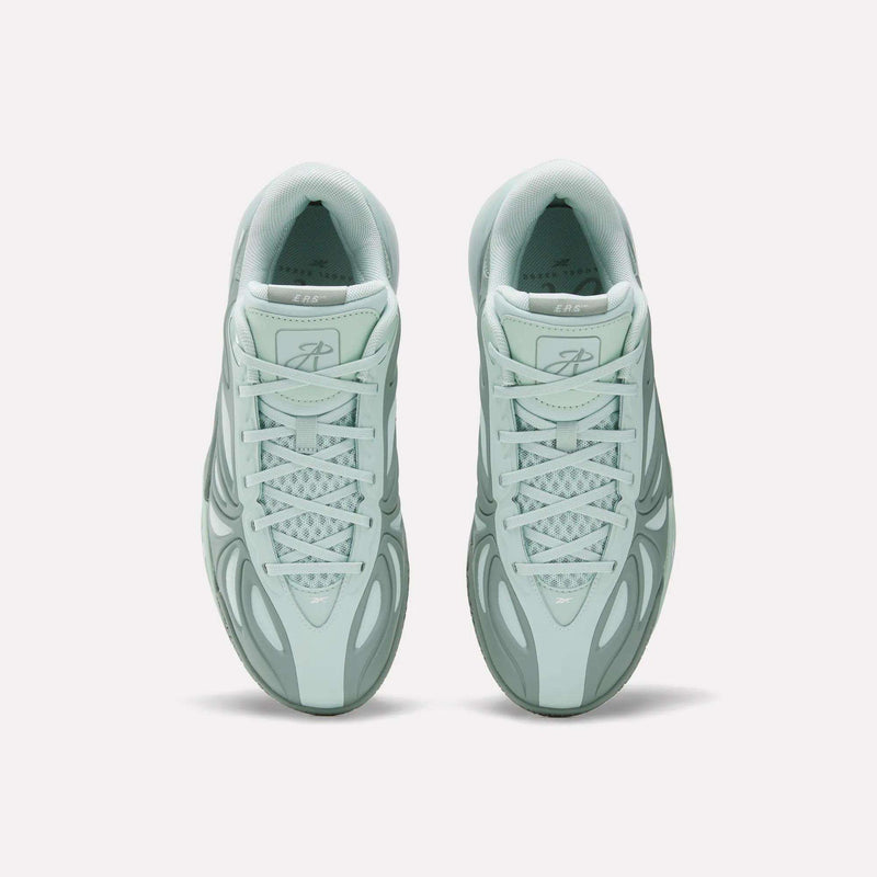 Top view of the Reebok Angel Reese 1 Basketball Shoes in light mint green, featuring geometric and wavy patterns—an ideal choice for performance basketball fans, displayed on a plain white background.