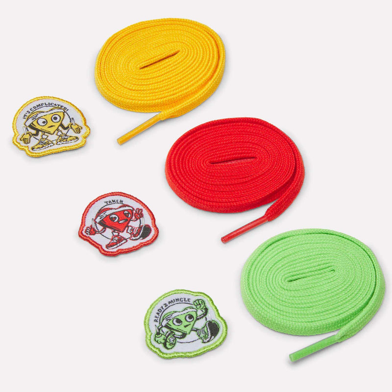 Three colorful shoelaces (yellow, red, green), each with a matching cartoon patch featuring motivational text, are perfect for customizing your Women's FloatZig 2 SoleMates Running Shoes by Reebok or any other performance running shoes.