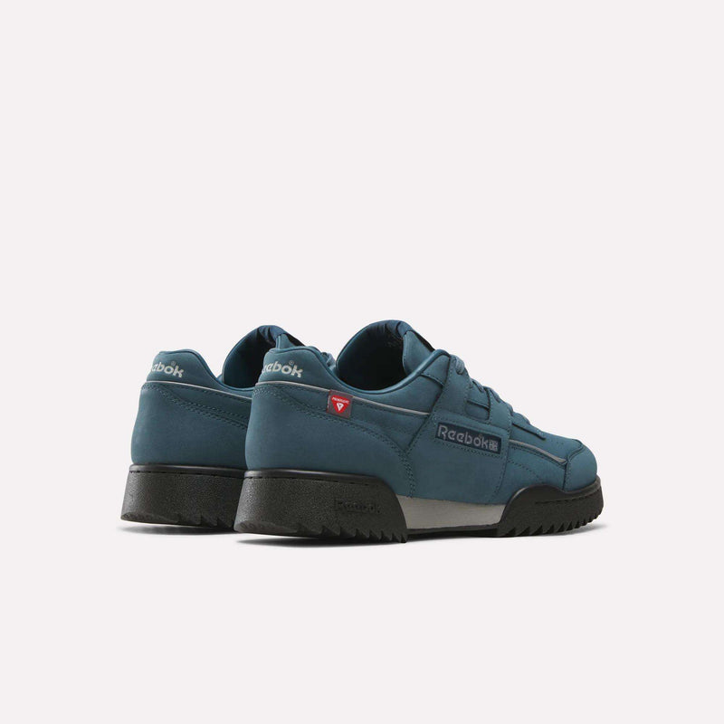 Pair of teal Reebok Workout Plus Ripple Shoes with black soles, shown from the back and side on a white background. These weather-ready sneakers feature PrimaLoft insulation to keep your feet warm and comfortable in any conditions.