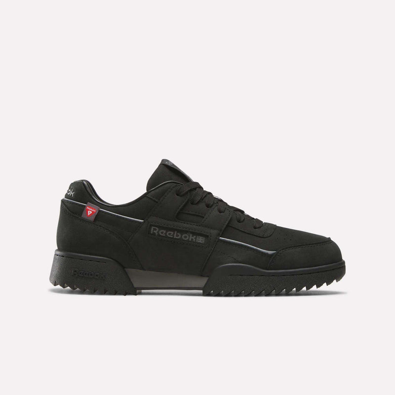A black/black/grey4 Reebok Workout Plus Ripple Shoe featuring laces, a chunky ripple sole, and subtle Reebok branding on the side and heel is displayed on a plain white background—these weather-ready sneakers are designed for all-day comfort in any condition.