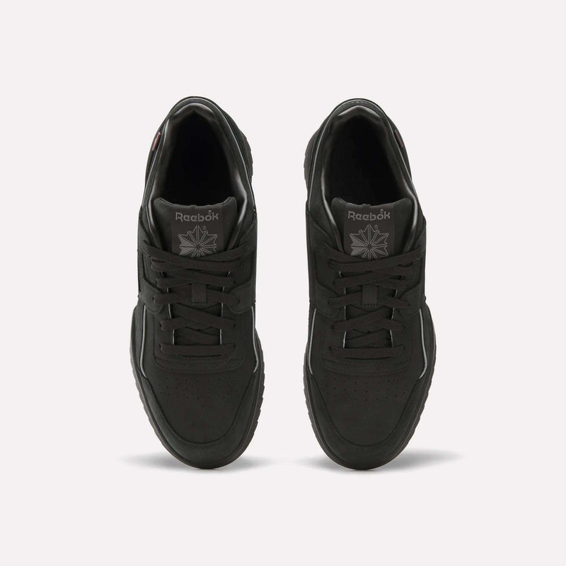 Top view of a pair of Reebok Workout Plus Ripple Shoes in black with laces, featuring the Reebok logo on the tongue, set against a plain white background.