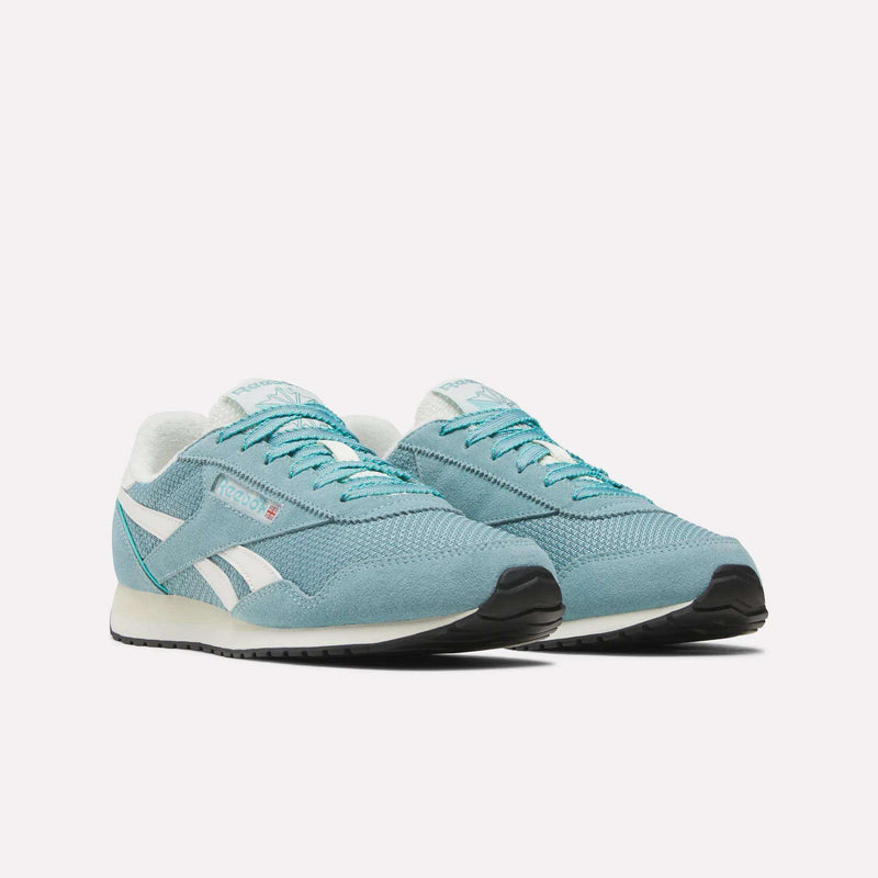 A pair of Women’s Classic AZ Shoes by Reebok, featuring a light blue retro running design with white accents and teal details, displayed side by side on a plain white background.