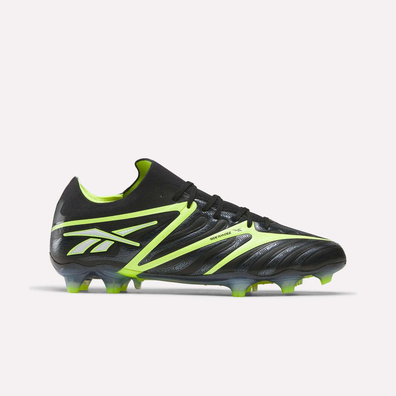 The Reebok Sidewinder 26 Elite FG Cleats are black with neon yellow accents and logo, shown on a white background. A textured surface boosts ball control, while molded studs provide traction on firm grass.