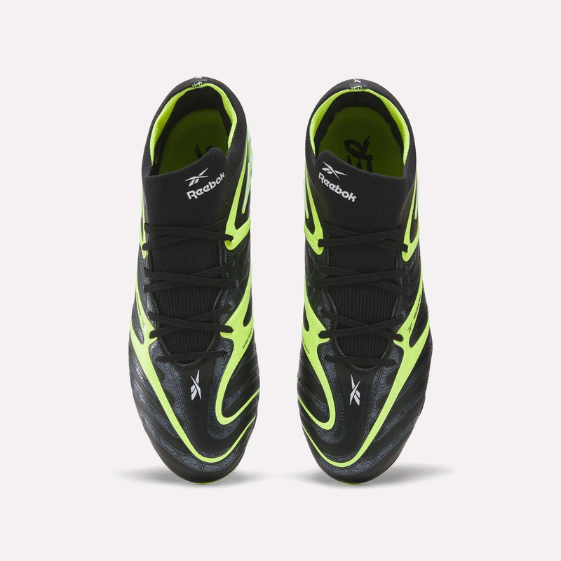 A pair of Reebok Sidewinder 26 Elite FG Cleats, shown from above, with black uppers, neon yellow accents, and white logos—designed for firm ground play and superior ball control.