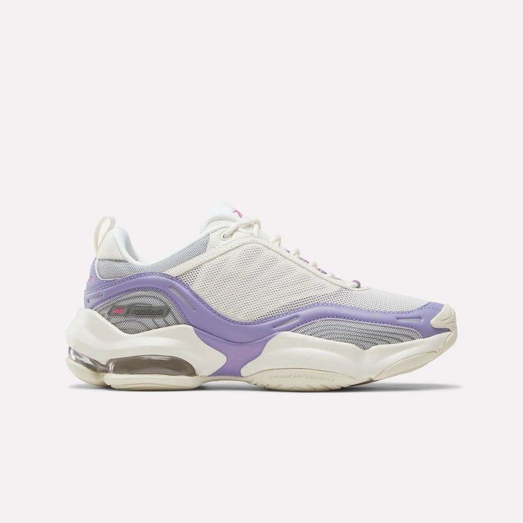 Introducing the Reebok Women’s DMX Series 3000 Shoes, featuring a stylish chalk mesh upper with Blackberry Metallic and True Pink accents. These sneakers are built for comfort with a chunky sole that provides lightweight support and includes visible DMX moving air technology in the heel, delivering an ultra-cushioned, energizing feel with every step.