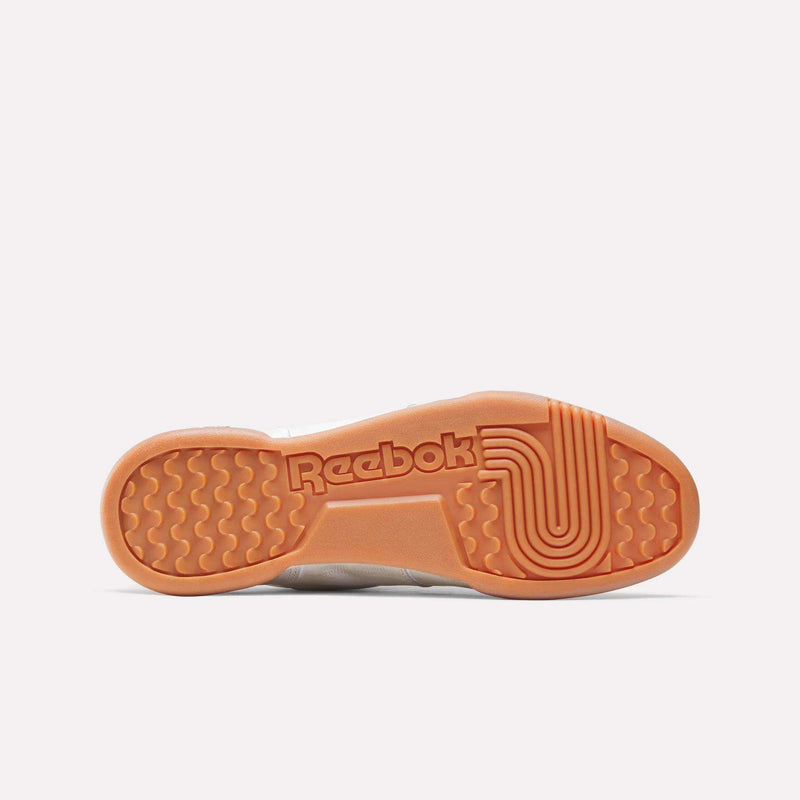 The image shows the sole of the Reebok x Hed Mayner Workout Plus OG Shoes with a gum-colored bottom, circular tread, textured ovals at the heel, a swirl grip pattern at the forefoot, and Reebok branding.