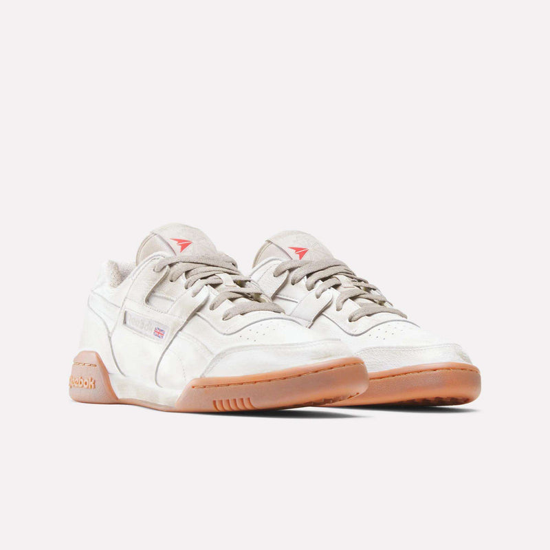The Reebok x Hed Mayner Workout Plus OG Shoes feature a white leather upper, beige laces, and gum rubber soles, displayed side by side against a plain white background.