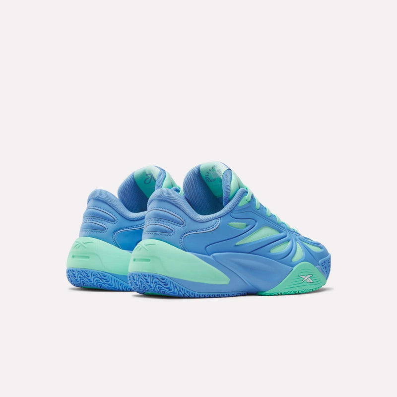 The Reebok Angel Reese 1 Shoes - Big Kids are blue and mint green low-top basketball sneakers with wavy designs and patterned soles, perfect for young athletes. Shown from the rear on a plain white background.