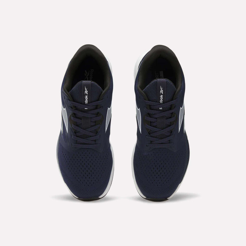 Top view of Reebok Men's Nanoflex Trainer 2 Shoes featuring navy blue uppers, white soles, and black interiors, displayed side by side on a plain white background.