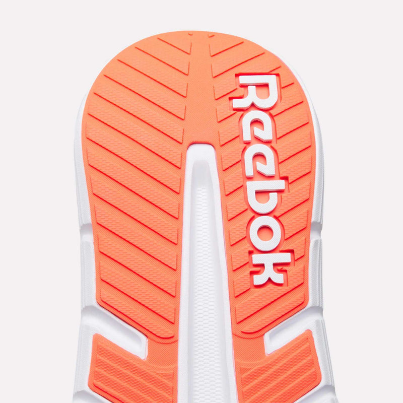 Close-up of the sole of Reebok Nano Gym 2.0 Training Shoes, featuring an orange and white design, high-rebound foam, and the Reebok logo in white on the orange section.