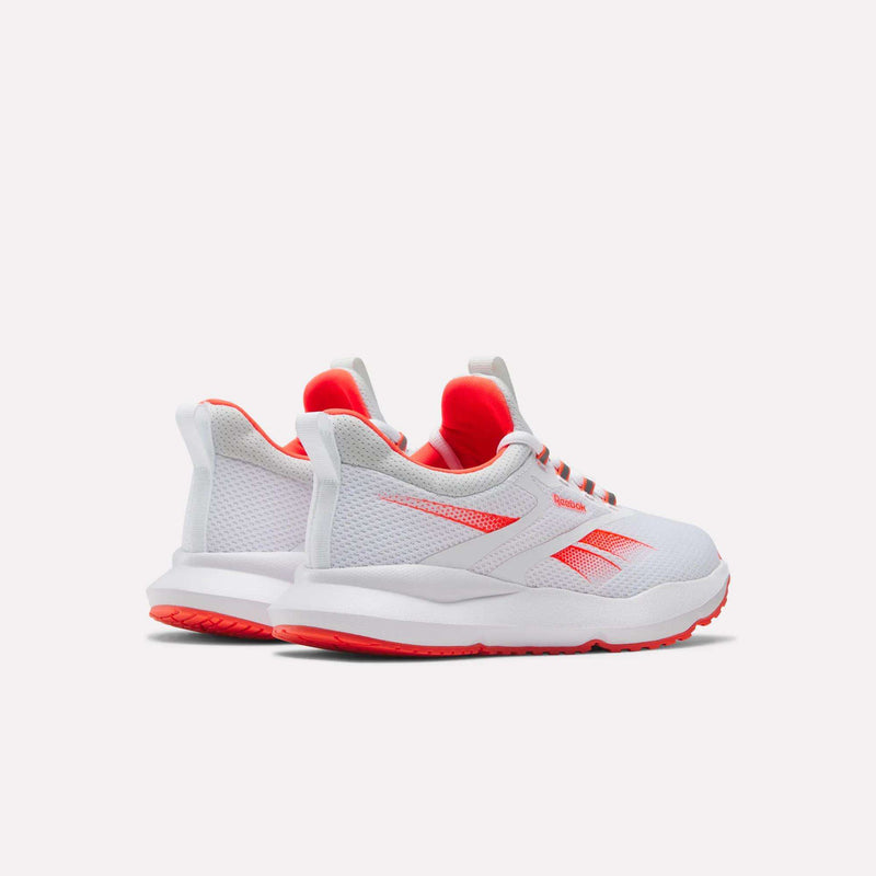 The Reebok Women's Cityride 2 Running Shoes are shown in white with red accents and soles, featuring breathable mesh, the Reebok side logo, and comfortable FuelFoam cushioning against a plain light background.