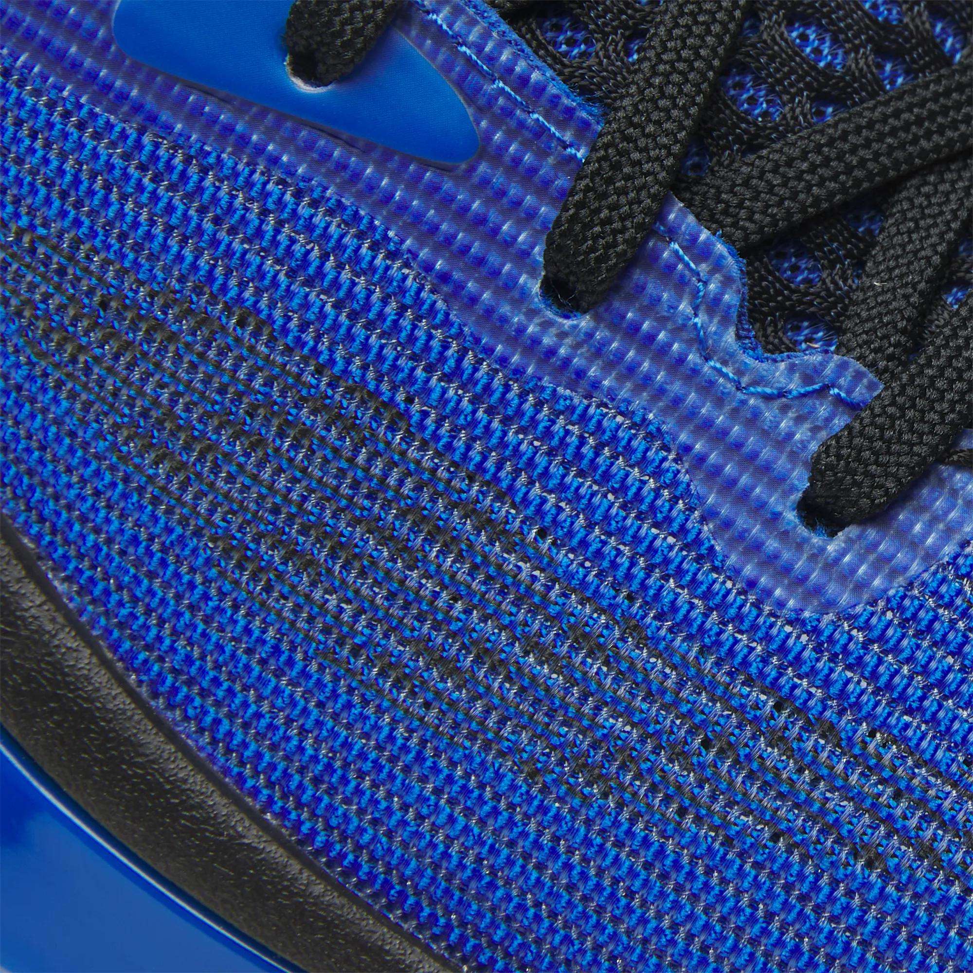 Close-up of the Reebok Engine A 26 Basketball Shoes shows a vibrant blue mesh upper, black laces, and textured details that highlight material and stitching patterns for enhanced stability and support on the court.
