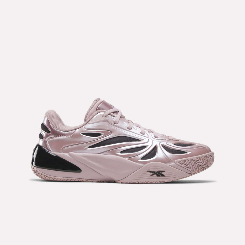 The Reebok Angel Reese 1 Basketball Shoes in metallic pink with black accents feature a wavy, futuristic design, textured sole, and Energy Return System—ideal for performance on the court. Shown from the side on a light background.