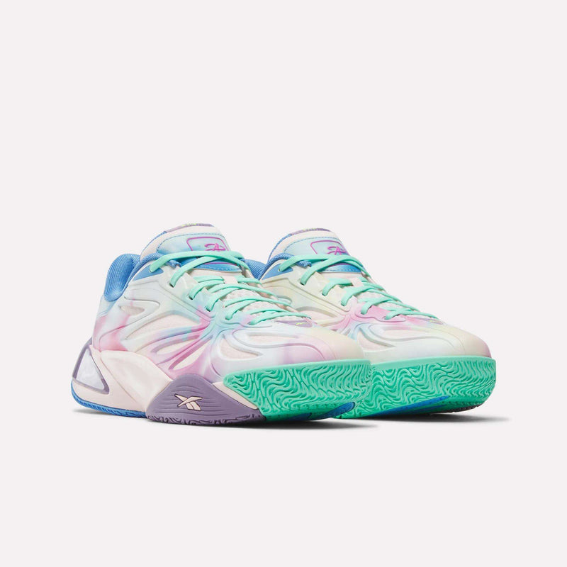 The Reebok Angel Reese 1 Basketball Shoes feature a pastel tie-dye design, light blue laces, mismatched outsoles, and the Energy Return System for added comfort—ideal for fans of stylish basketball sneakers.