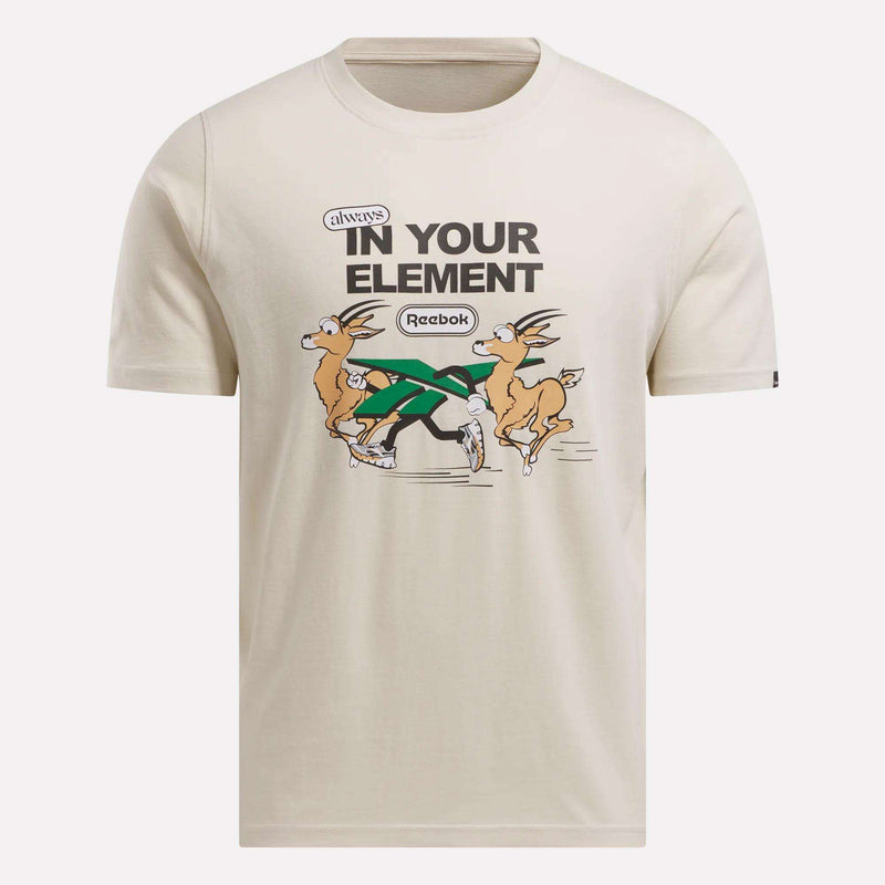 The Men's Club Graphic T-Shirt by Reebok is a 100% cotton beige tee featuring cartoon antelopes in sneakers running together, with "always IN YOUR ELEMENT" and the Reebok logo printed above them.