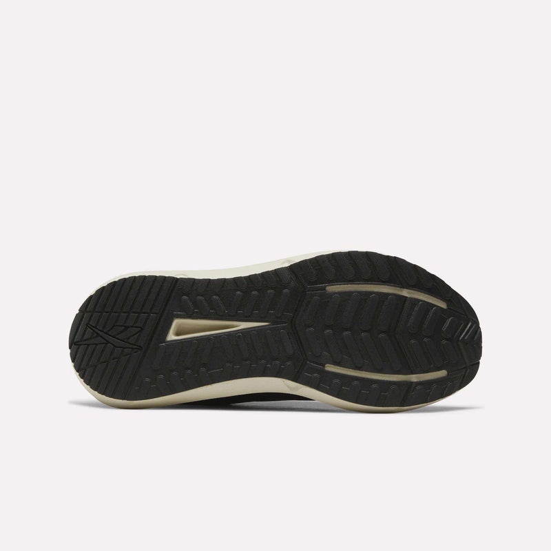 The image shows the black rubber outsole of Reebok Men's Cityride 2 Running Shoes with textured tread for grip and a light midsole with FuelFoam cushioning, as the shoe lies flat, sole facing up on a plain white background.