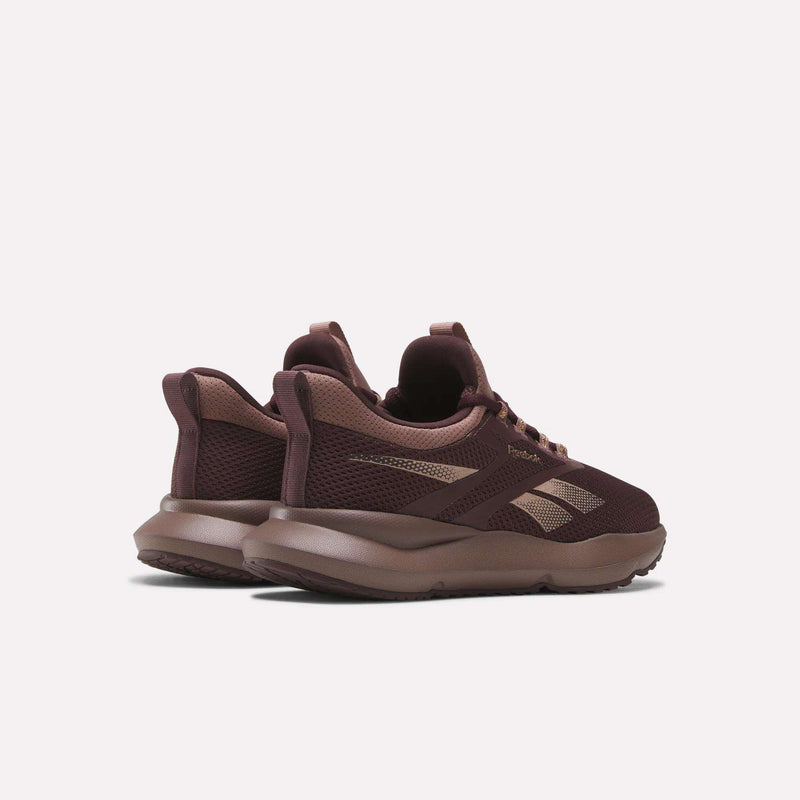 A rear side view of Women's Cityride 2 Running Shoes by Reebok in brown, featuring mesh uppers, FuelFoam cushioning, and the Reebok logo, shown on a plain light background.