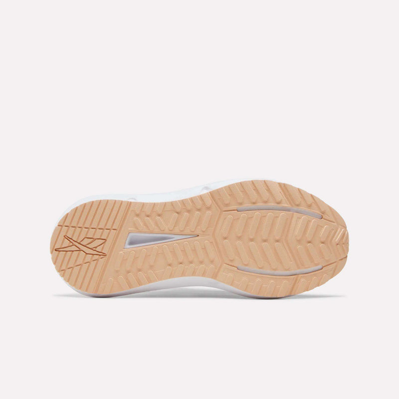 The image shows the tan rubber outsole of the Reebok Women's Cityride 2 Running Shoes, featuring a textured tread pattern and the Reebok logo on the left side, highlighting the durability and grip ideal for running shoes with FuelFoam cushioning.