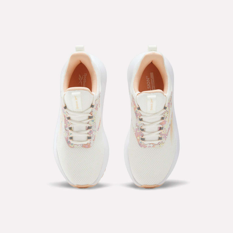 Women's Cityride 2 Running Shoes by Reebok, designed for running, are shown from above on a light background. These white athletic shoes feature multicolored accents around the laces, a peach-colored interior lining, a pull tab at the heel, and FuelFoam cushioning for enhanced comfort.