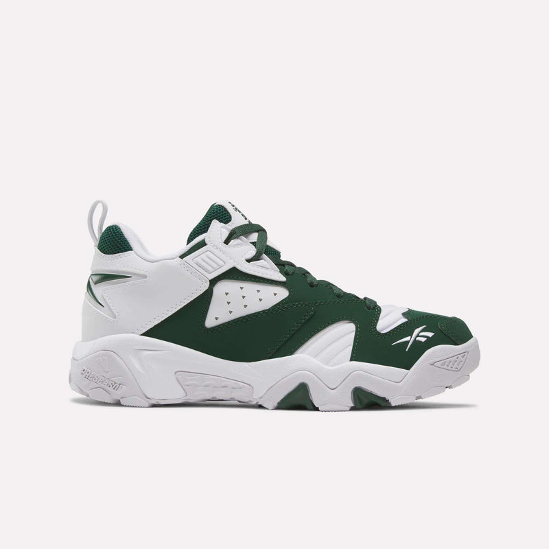 The Brutus Low Shoes by Reebok are athletic sneakers in Heritage Green and White, featuring mesh and leather panels, a chunky sole, and the Reebok logo on the heel and toe. Inspired by 90s style, these shoes offer a lightweight EVA midsole for added comfort. Shown in side profile on a plain white background.
