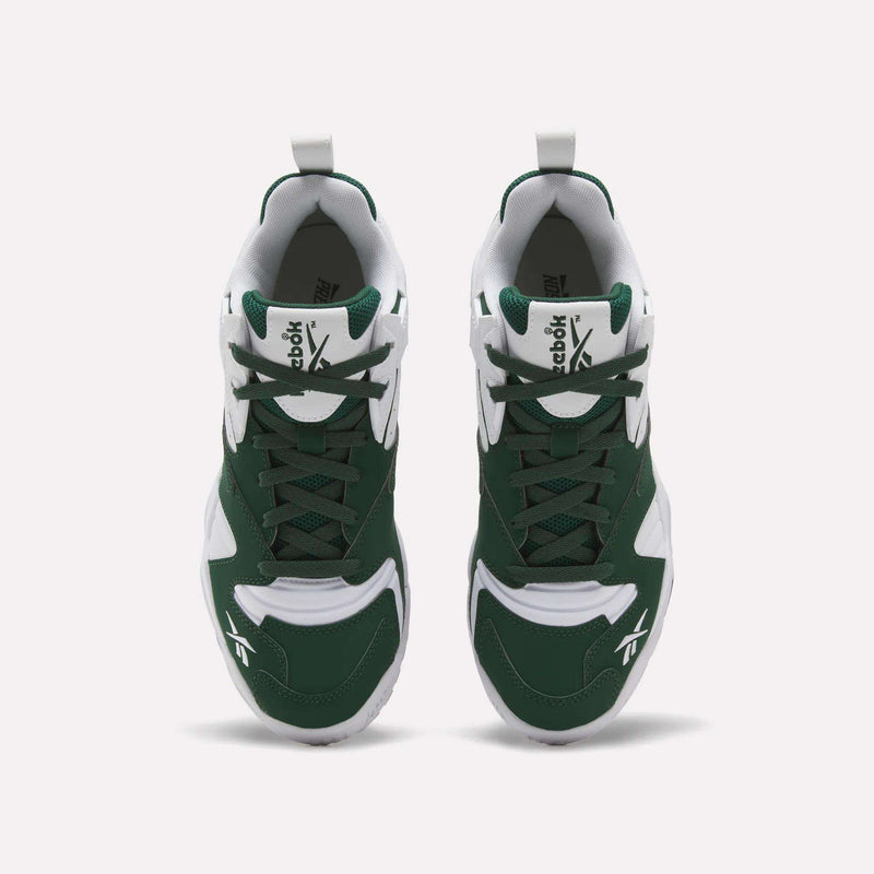 A pair of Brutus Low Shoes by Reebok in green and white is displayed from above, highlighting the laces, tongue, and signature logo on each shoe against a plain white background. Inspired by 90s style, these sneakers feature a lightweight EVA midsole for all-day comfort.