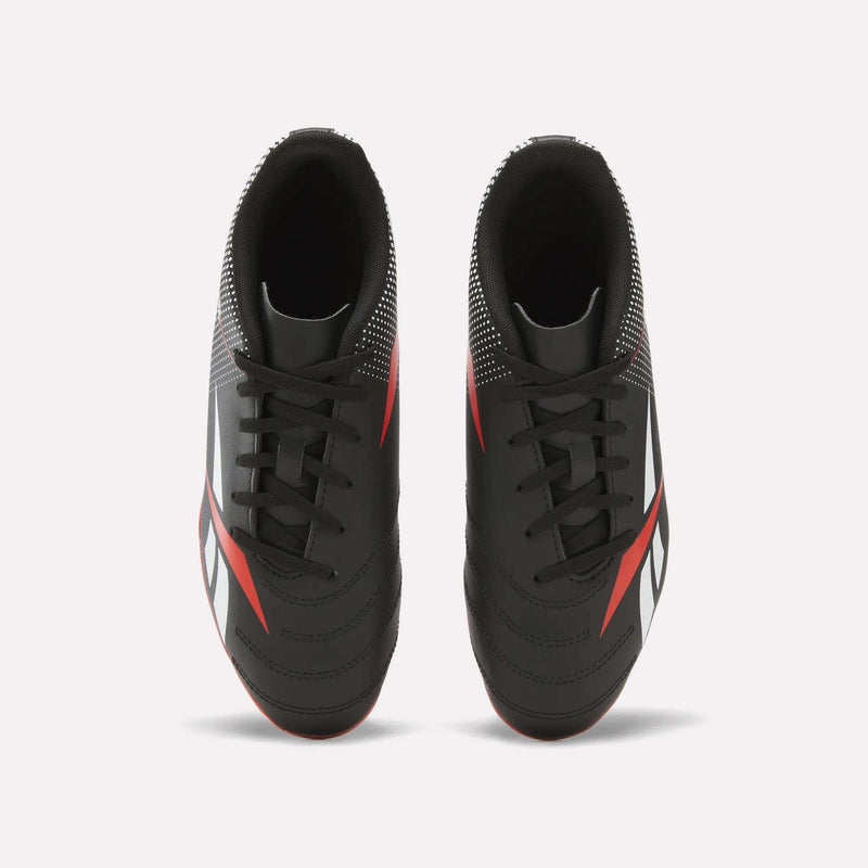 The Strike Multi-Ground Soccer Shoes - Big Kids by Reebok feature a black design with red and white accents, visible laces, and side stripes—ideal for turf play.
