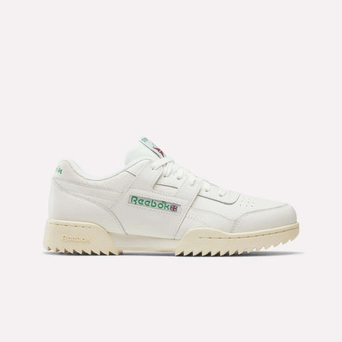 The Reebok Workout Plus Ripple Shoes in Chalk/Vintage Chalk/Paperwhite showcase a low-top silhouette with green logo accents, beige sole, perforated toe box, and chunky tread. Photographed side-on against a plain white background, these classic sneakers blend retro fitness style with enduring comfort.