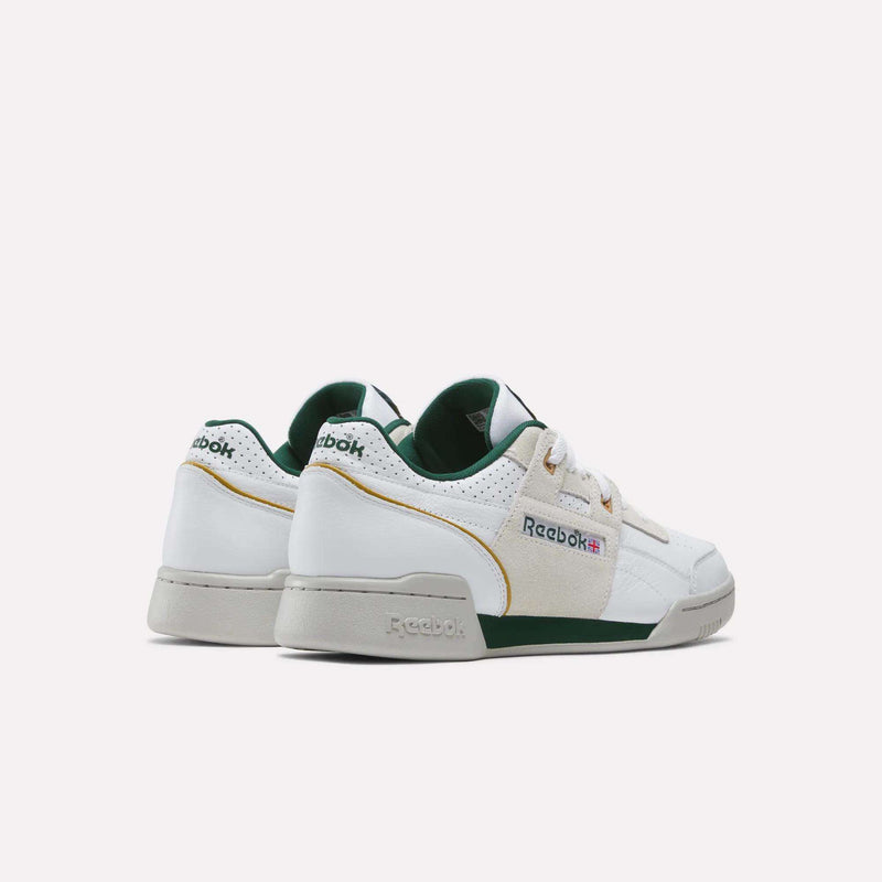 Retro-inspired Reebok Workout Plus shoes featuring white leather panels, tan suede accents, green trim, and grey outsoles.