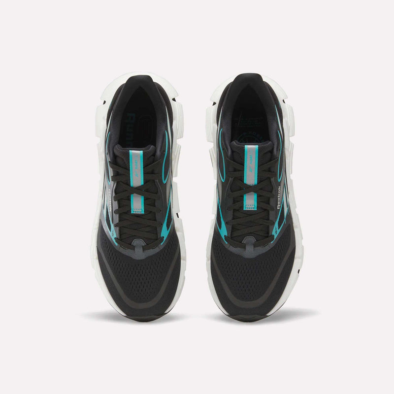 A pair of Men's FloatZig 2 Running Shoes by Reebok, black with white soles and turquoise accents, featuring Superfloat+ cushioning, shown side by side from above on a plain white background.